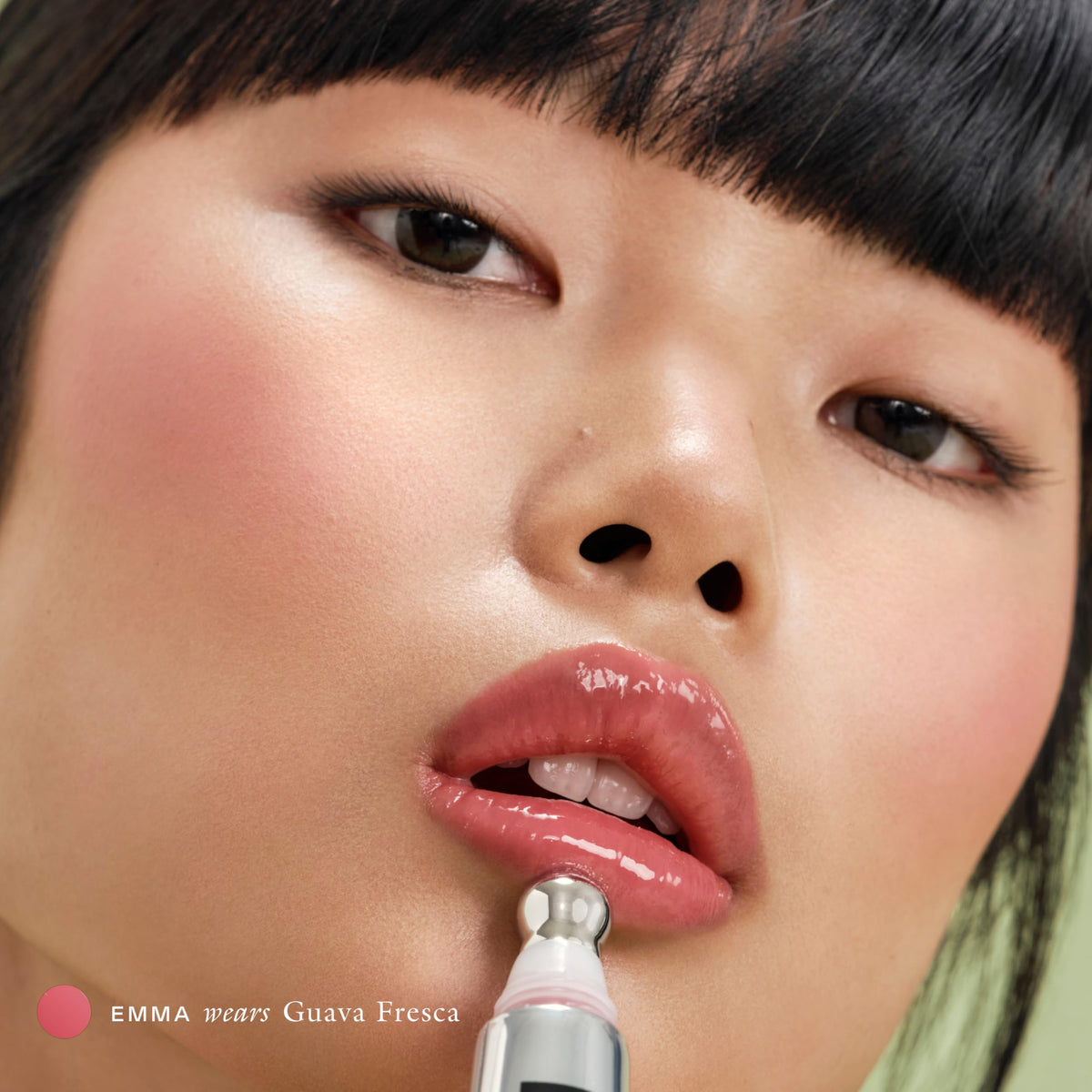 EADEM Tinted Lip Balm Guava Fresca with natural background