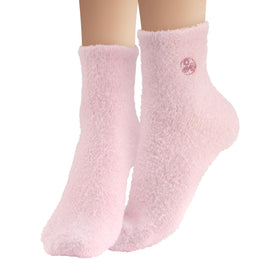 Earth Therapeutics Aloe Vera Socks displayed with foot lotion