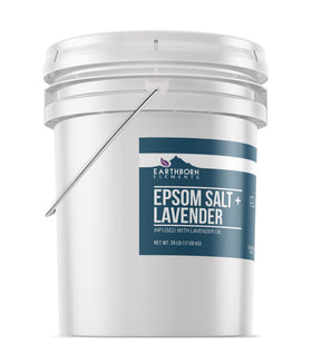 Earthborn Elements Lavender Epsom Salt being poured into a bath