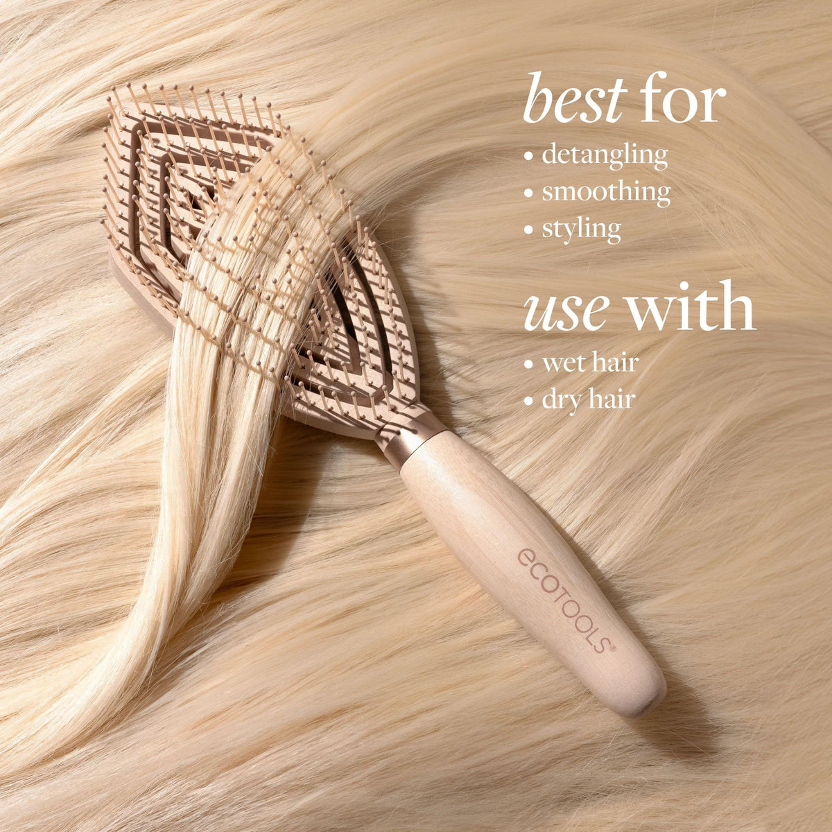 EcoTools Fine Hair Detangler brush held in hand with no-slip grip