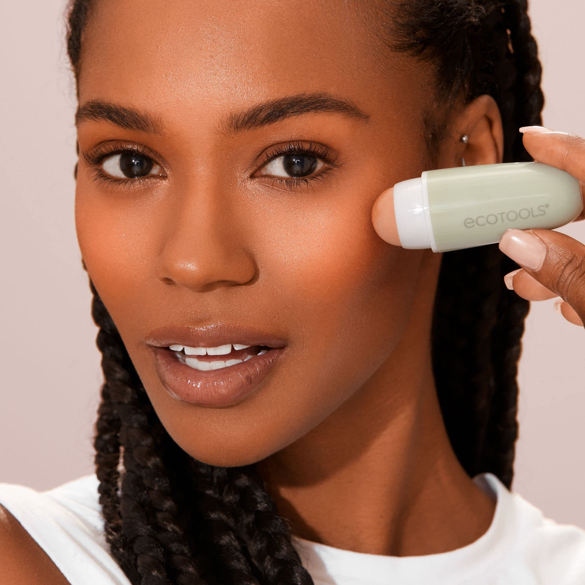 EcoTools Oil Absorbing Facial Roller being used on skin