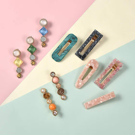 Elegant Mehayi hair clips arranged in a decorative pattern