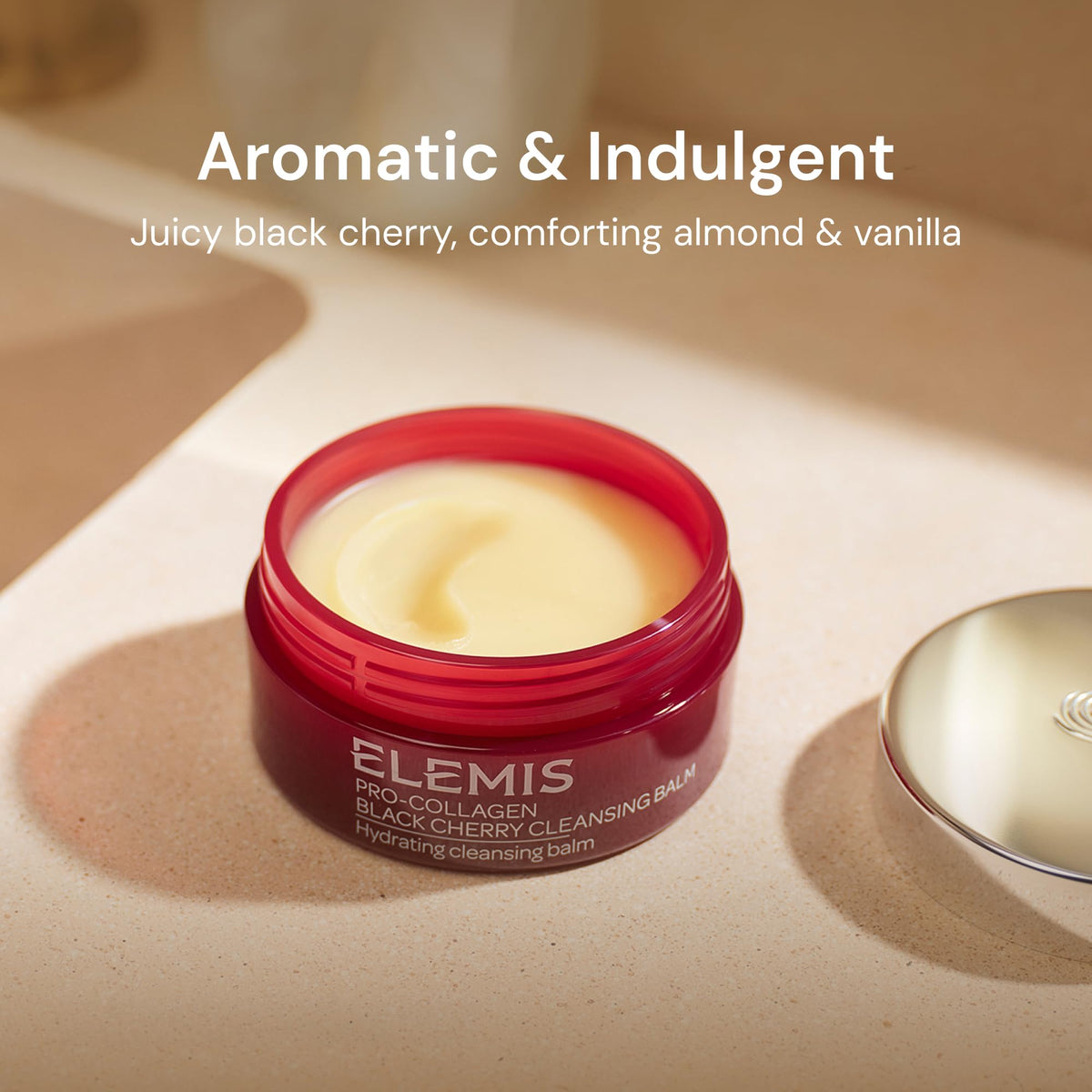 ELEMIS Pro-Collagen Black Cherry Cleansing Balm in a bathroom setting