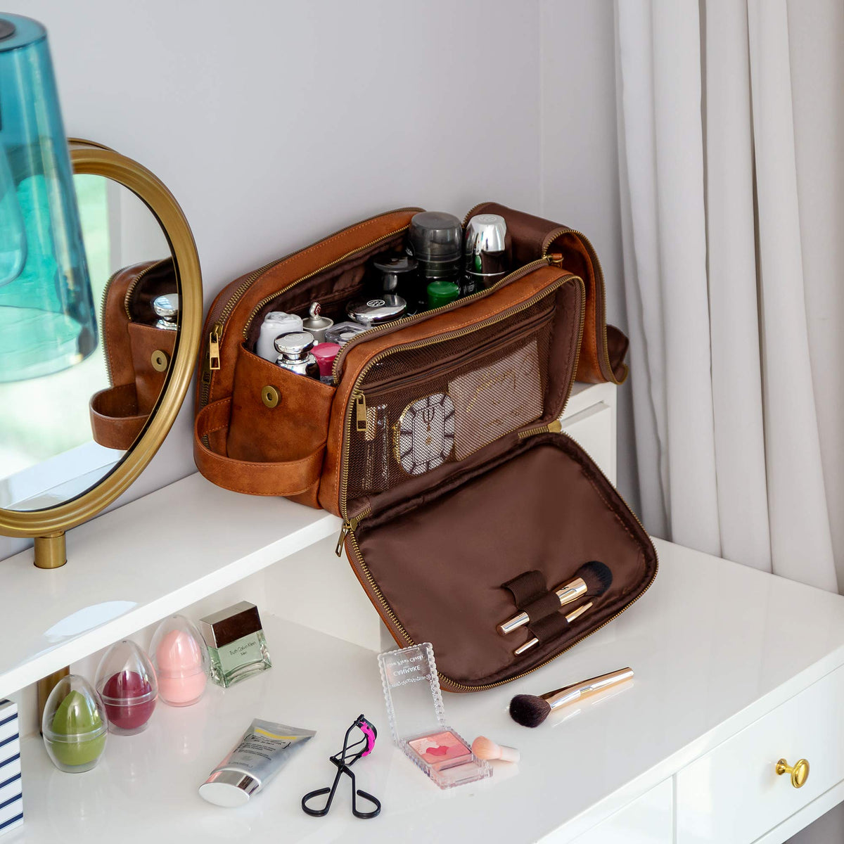 Elviros Travel Toiletry Bag in a travel setting