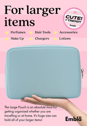 Embla Large Makeup Bag displayed with makeup products