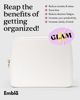 Embla Large Makeup Bag in a travel suitcase
