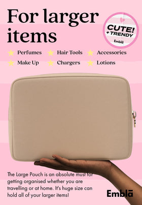 Embla Large Makeup Bag open showing storage space