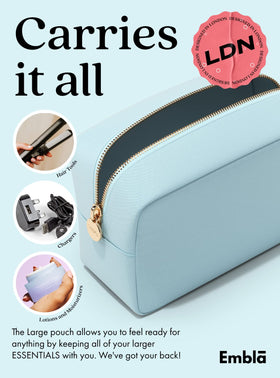Embla Large Makeup Bag used as a clutch handbag