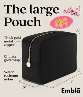 Embla Makeup Bag open showing organized cosmetics