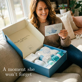Embroidered shell fuzzy socks included in the gift box