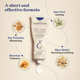 Embryolisse Lait-Crème Concentré on a vanity with makeup tools