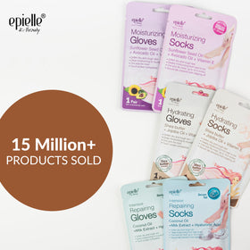 Epielle Hydrating Socks and Gloves laid out on a flat surface