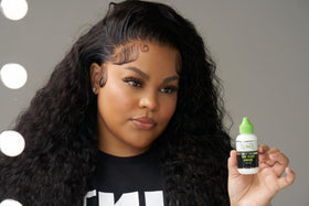Ericka J Hold Me Down Adhesive being applied on hair