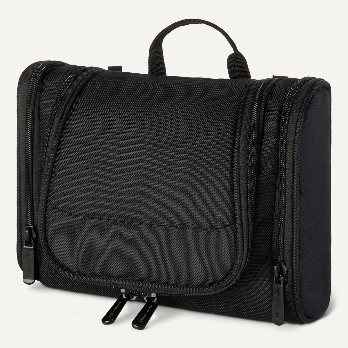 Essentials toiletry bag side view with external compartments