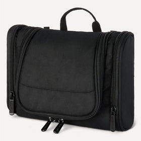 Essentials toiletry bag side view with external compartments