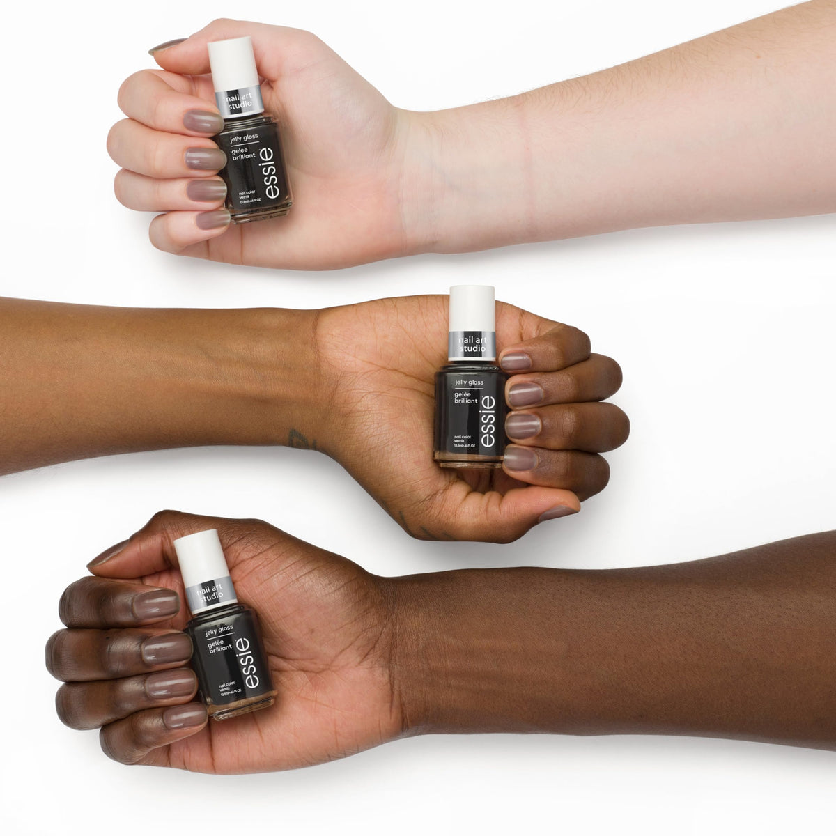 essie Jelly Gloss Polish sheer black bottle with nail art tools