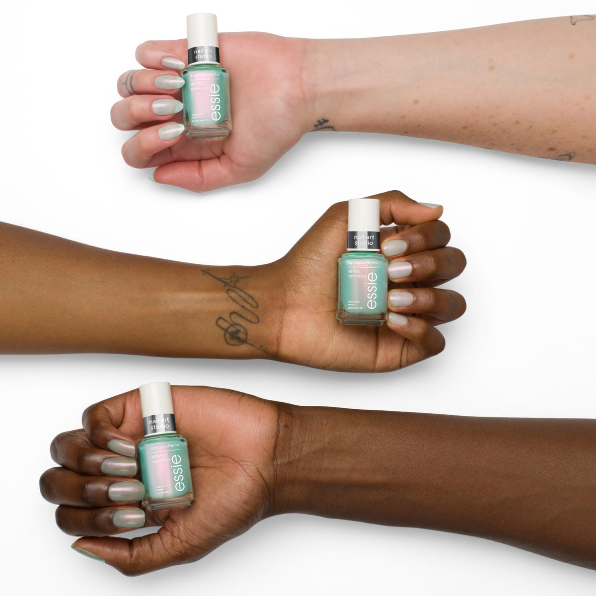 essie Mystic Marine nail polish applied on nails showcasing the unique effect