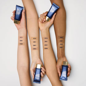 Estée Lauder Double Wear Foundation with applicator close-up