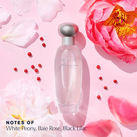 Estée Lauder Pleasures Eau de Parfum bottle with floral background