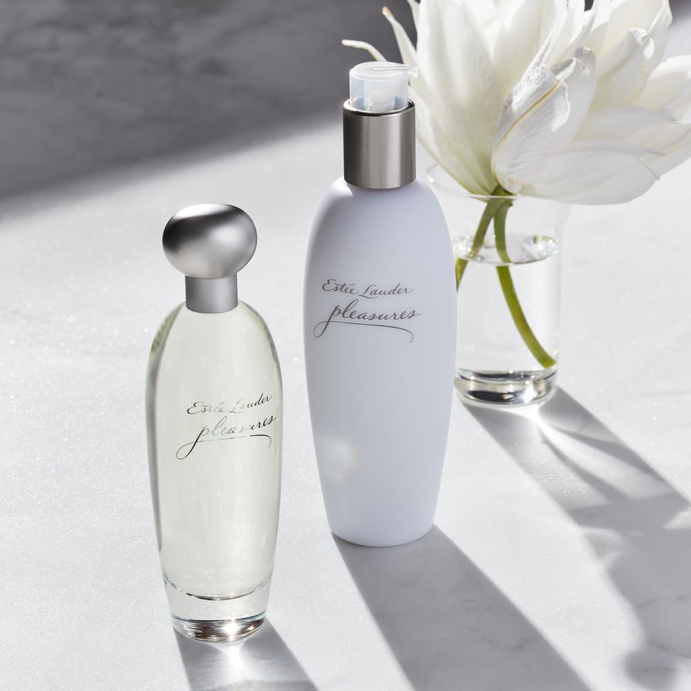 Estée Lauder Pleasures Eau de Parfum on vanity table