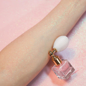 Etercycle Pink Body Glitter Spray in use at a festival
