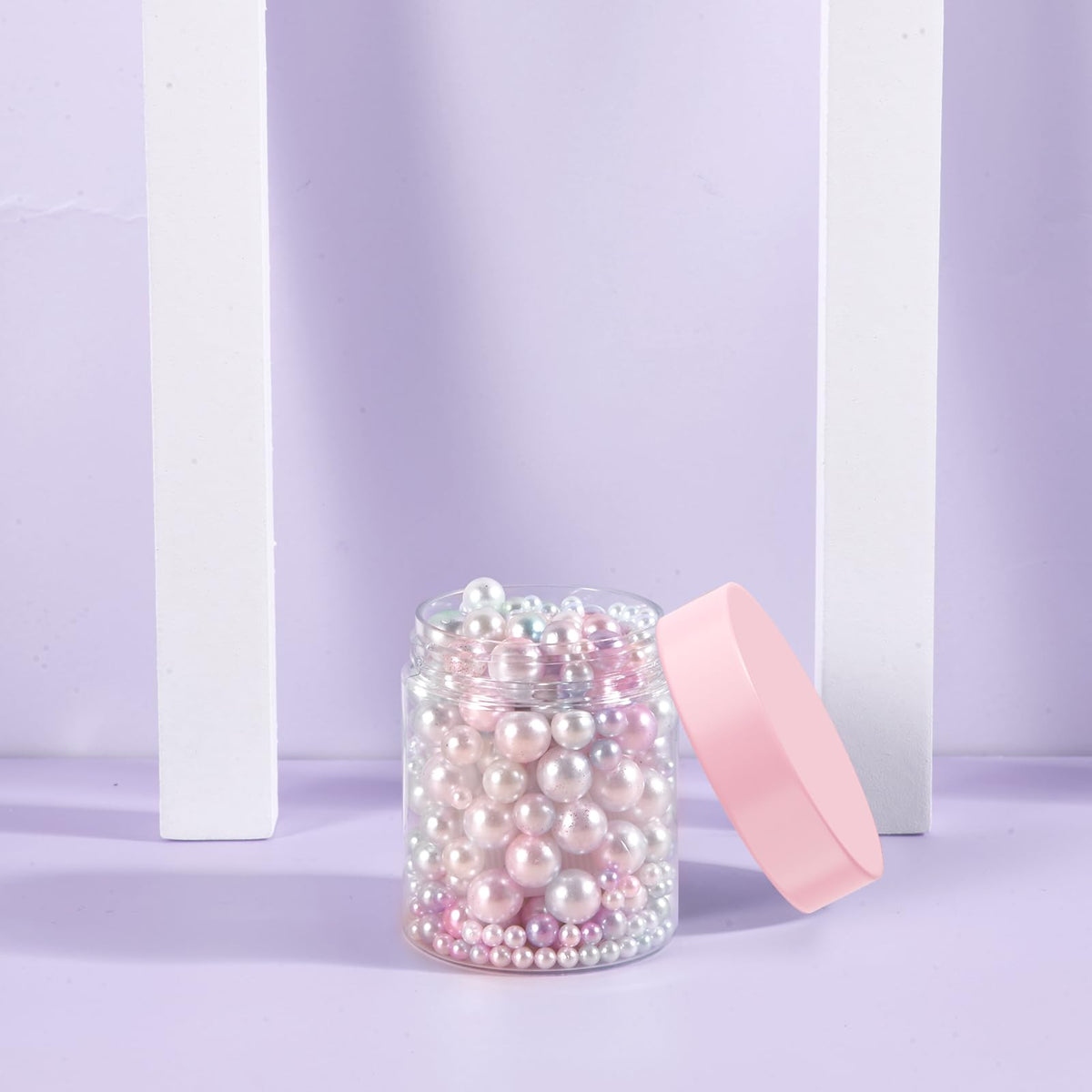 Eternal Moment jars displayed with various cosmetics