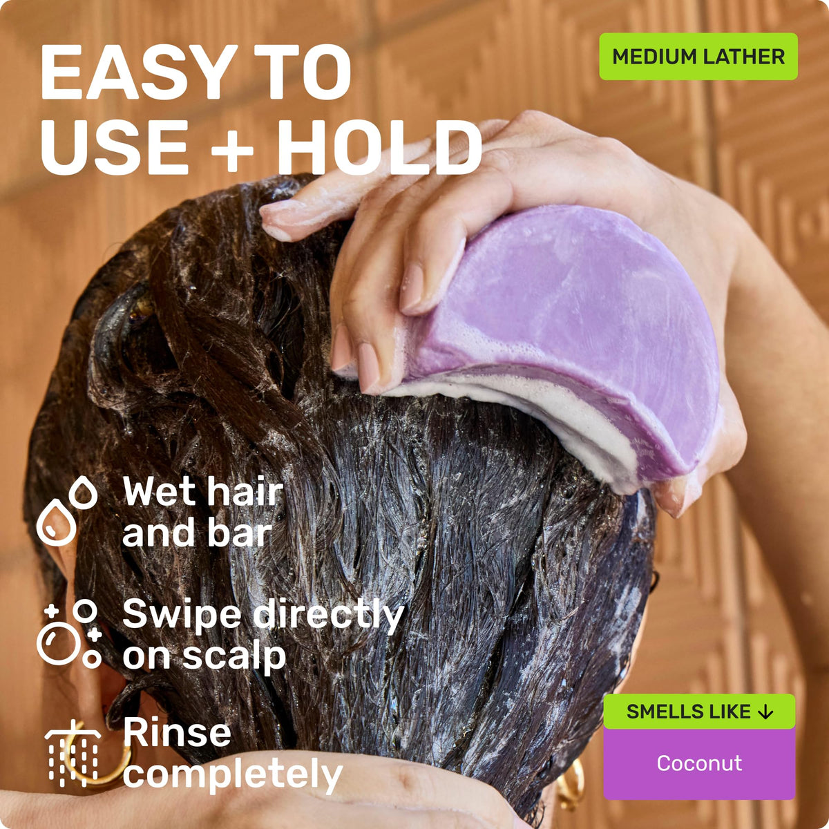 Ethique Smoothing Shampoo Bar on a bathroom counter