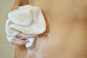 Evriholder washcloths hanging in a shower