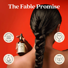 Fable & Mane HoliRoots Hair Oil with ingredients displayed