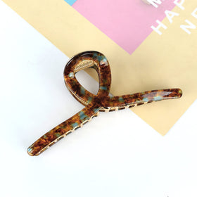 FAELBATY Big Hair Claw Clip displayed with other hair accessories