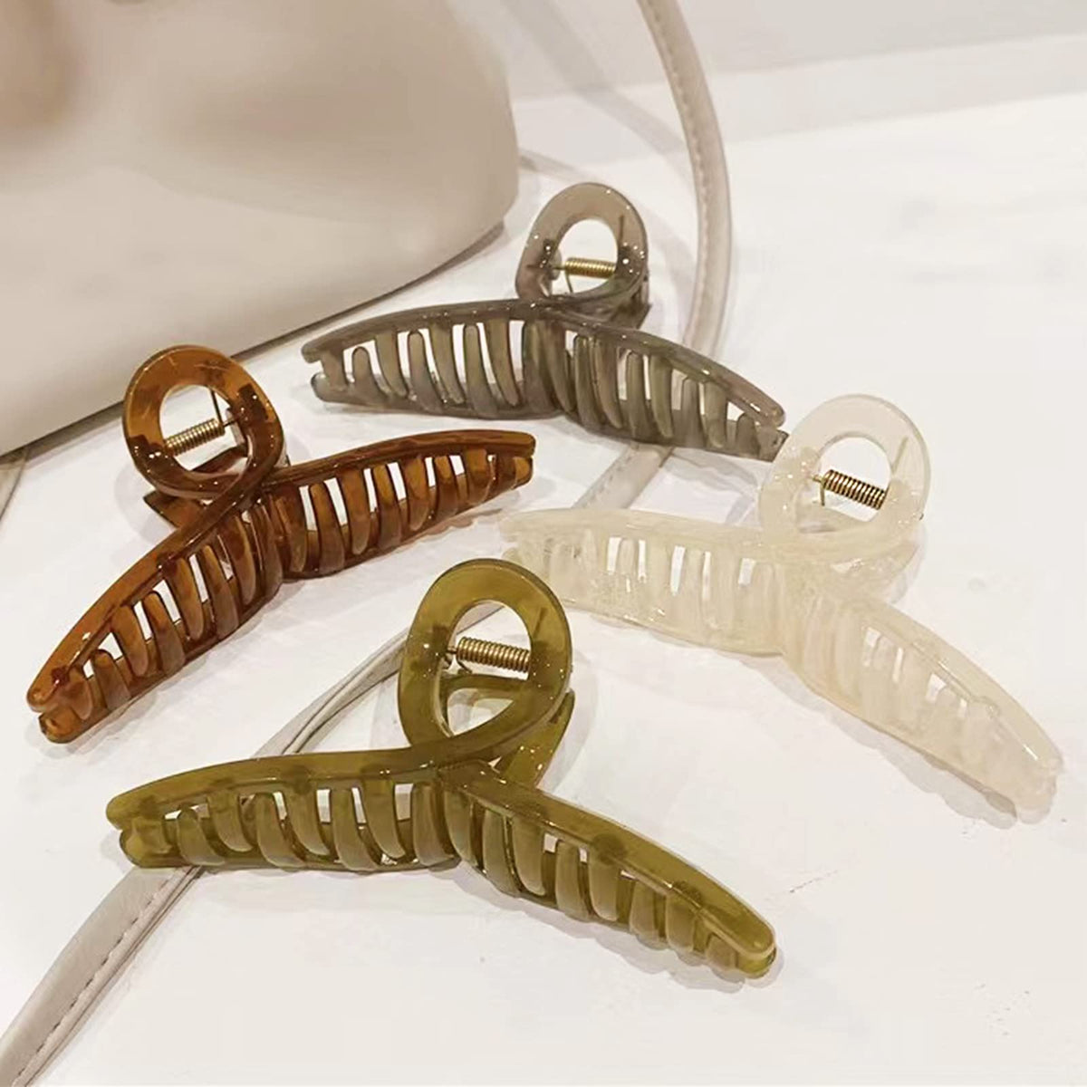 FAELBATY Big Hair Claw Clips set in light pink, jade green, brown, and gray