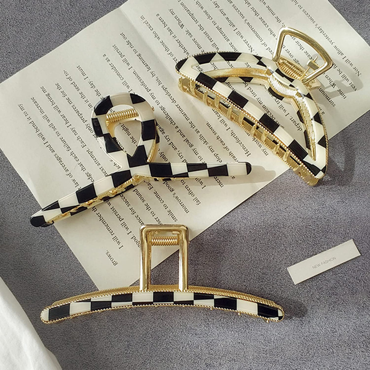 FAELBATY large acetate hair clip in checker pattern, side view