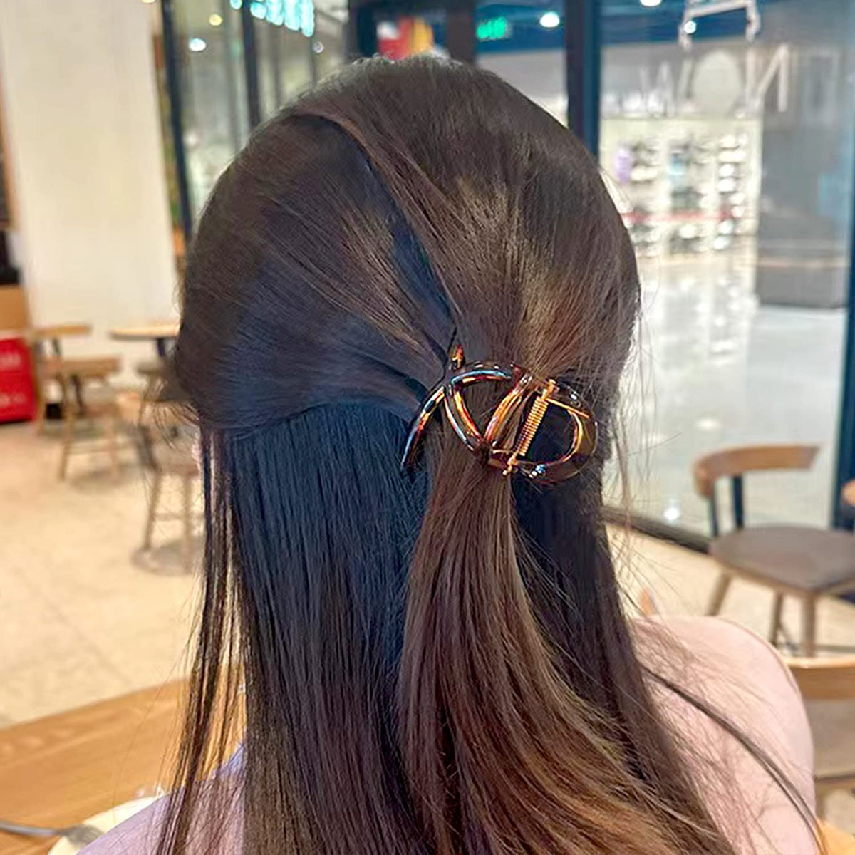 FAELBATY light coffee hair claw clip on a vanity