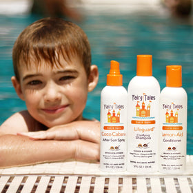Fairy Tales Sun & Swim Shampoo and Conditioner set on a bathroom counter