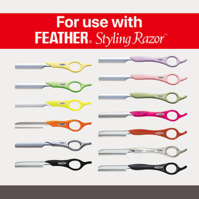 Feather blades displayed on a cutting surface