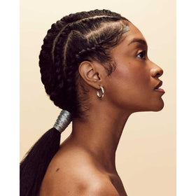 FENTY BEAUTY Hair-Thickening Edge Control Gel side view with cap