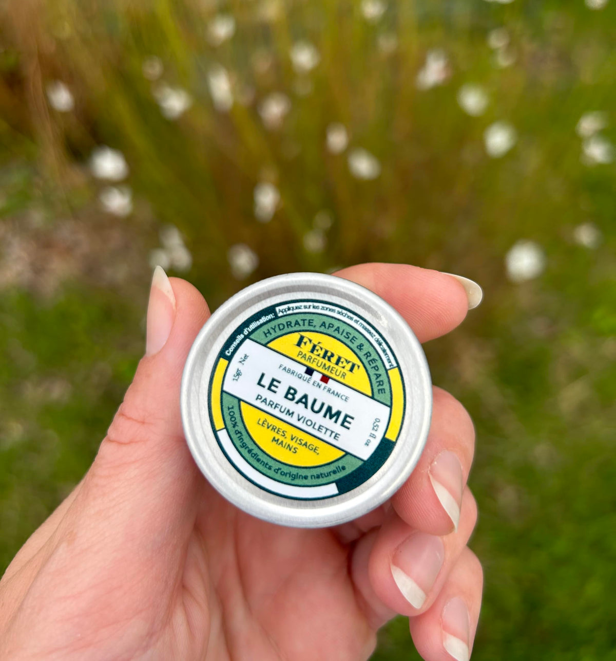 Feret Parfumeur balm in vintage tin on a vanity table