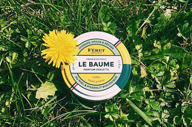 Feret Parfumeur Violette Balm in a hand for application