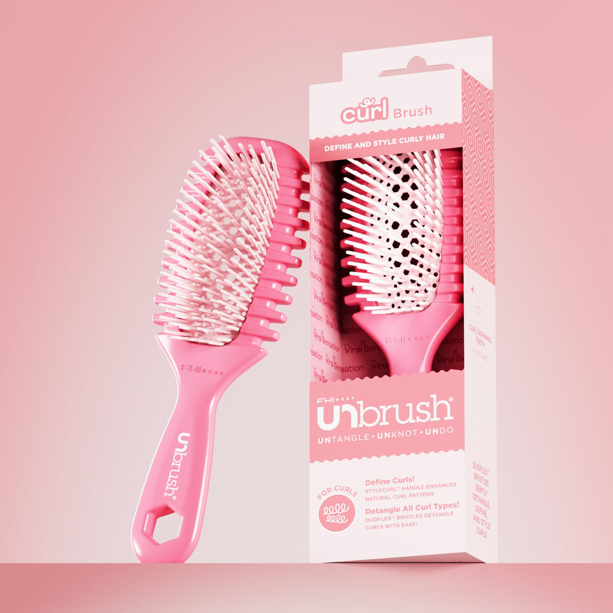 FHI Heat UNbrush Curl Detangling Brush in use on wet hair