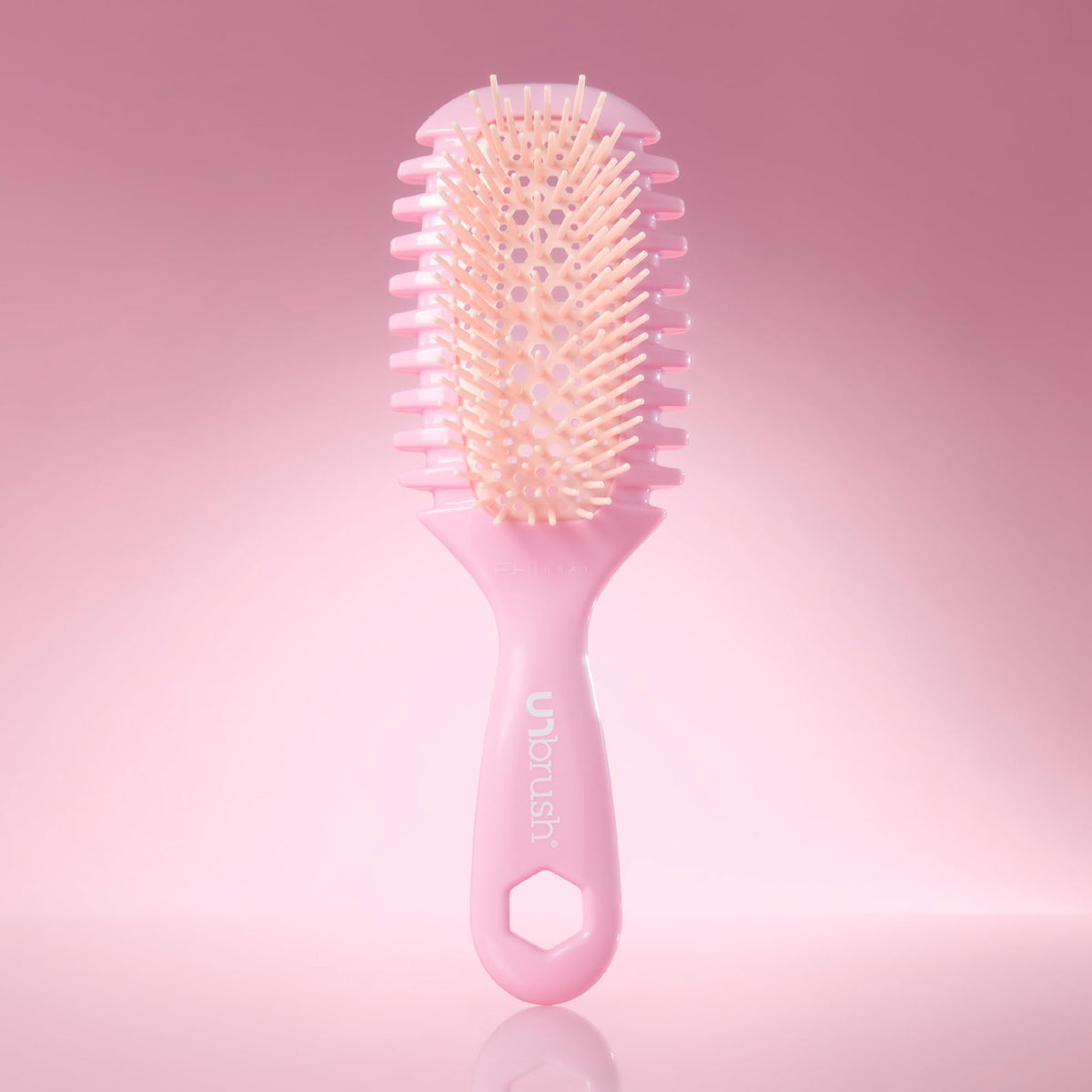 FHI Heat UNbrush Curl Detangling Brush with styling products