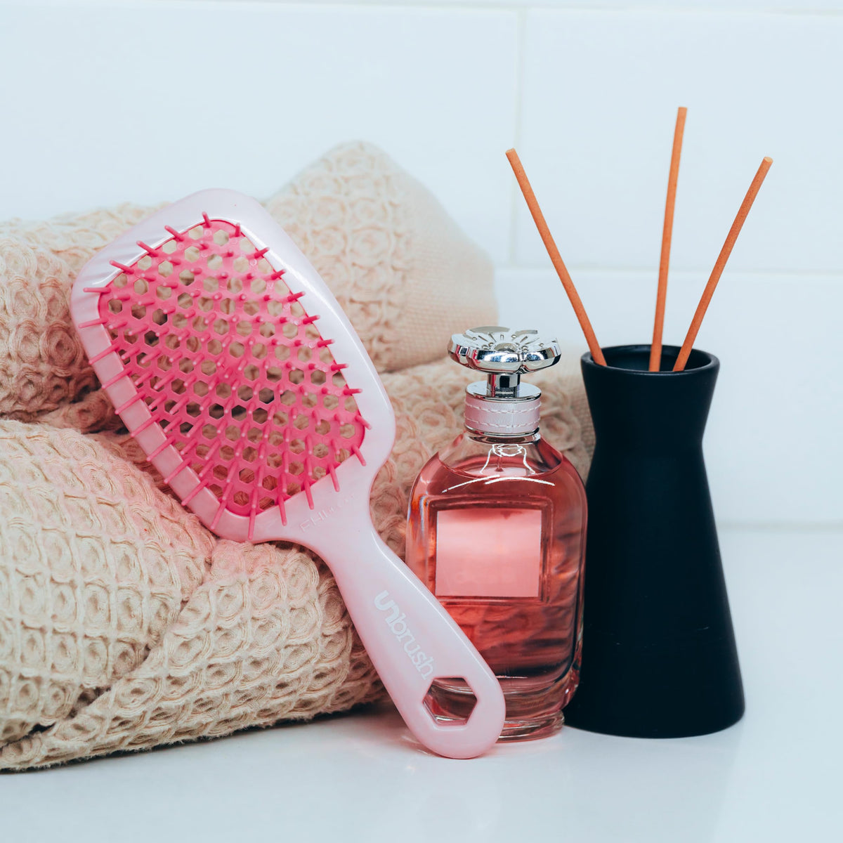 FHI Heat UNbrush Detangling Brush in a travel bag