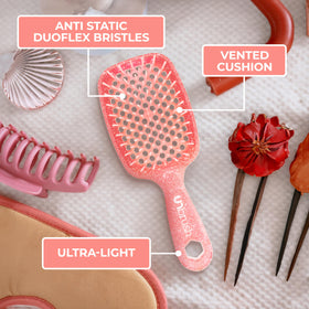 FHI Heat UNbrush Detangling Brush in use on dry hair