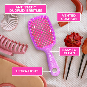 FHI Heat UNbrush Detangling Brush in use on wet hair