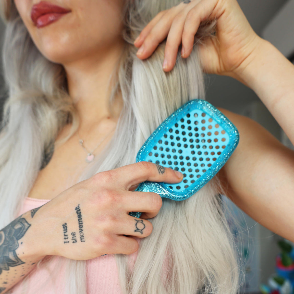 FHI Heat UNbrush Detangling Brush lifestyle scene