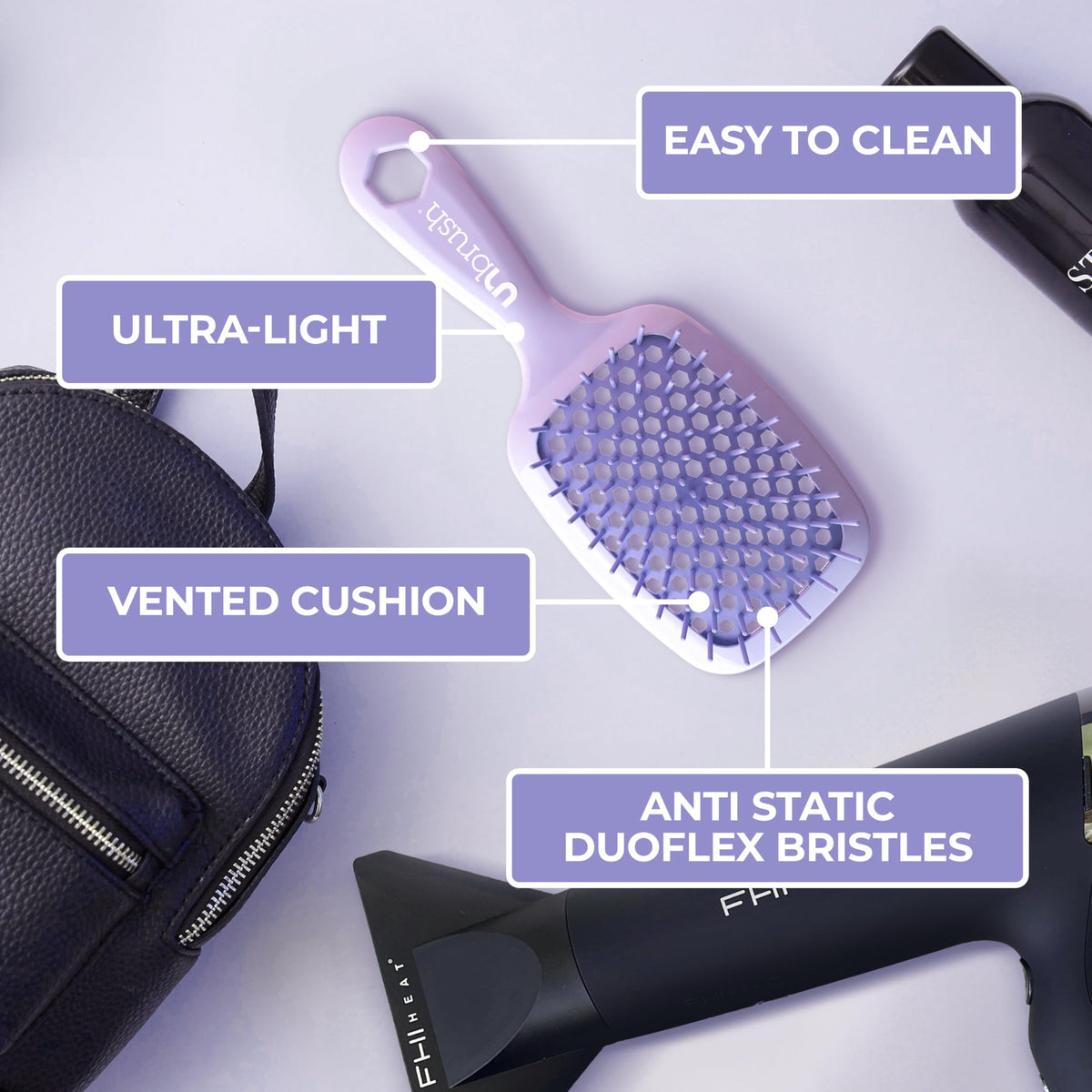 FHI Heat UNbrush Detangling Brush on a bathroom counter