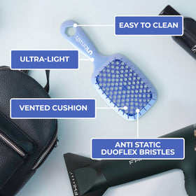 FHI Heat UNbrush Detangling Brush on a bathroom counter