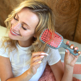 FHI Heat UNbrush Detangling Brush packaging display