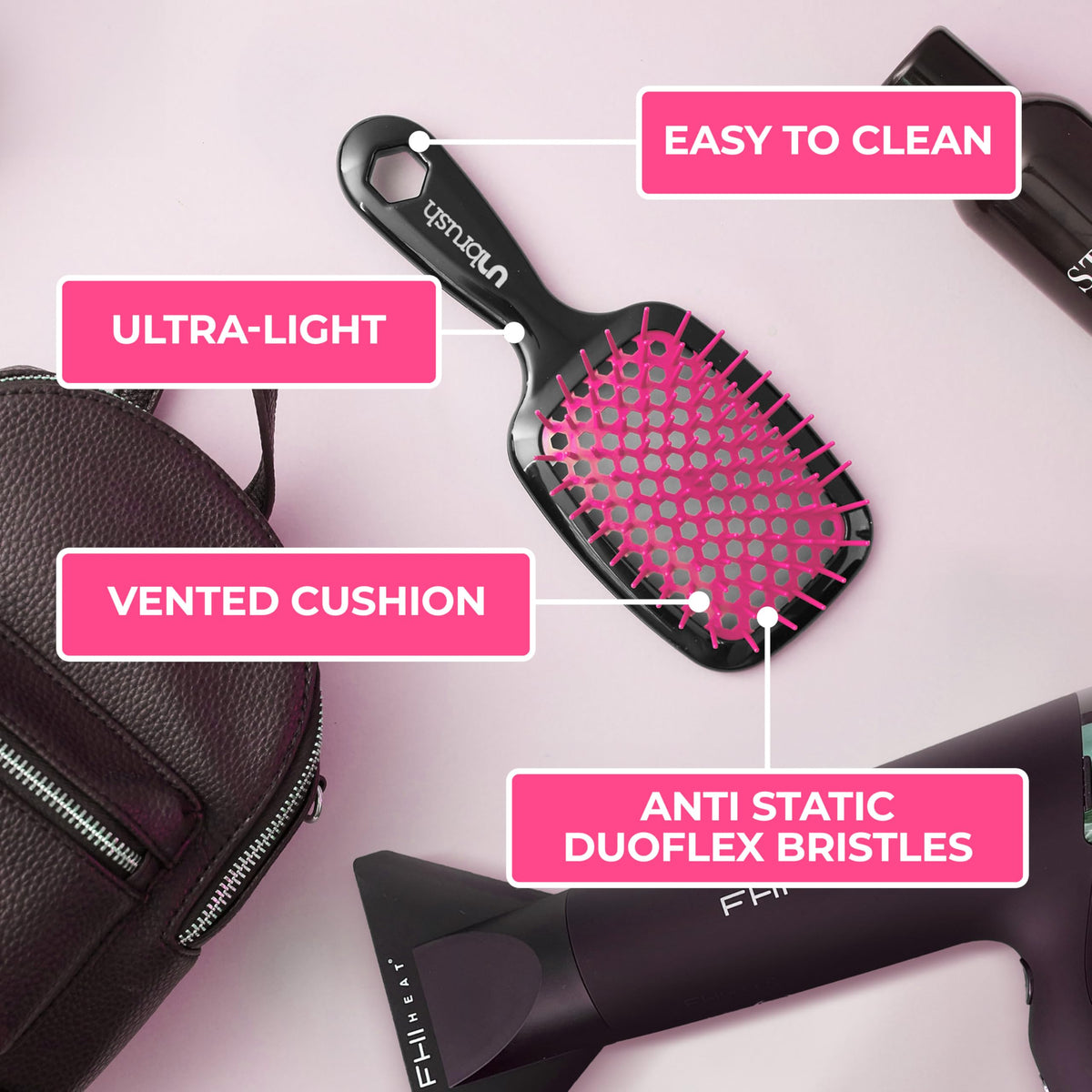 FHI Heat UNbrush Detangling Brush with wet hair showing detangling capability