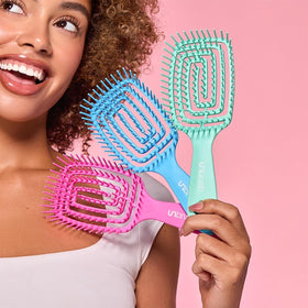 FHI Heat UNbrush Flex Detangling Brush back view showing vented design