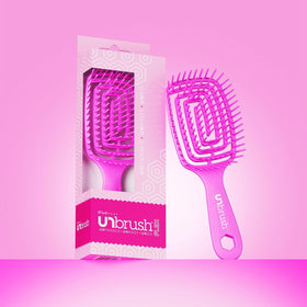 FHI Heat UNbrush Flex Detangling Brush held in hand for easy use